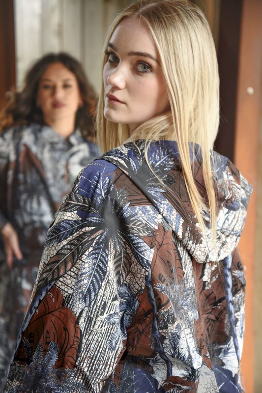 									GLOW WITH THE FLOW RAINCOAT
			