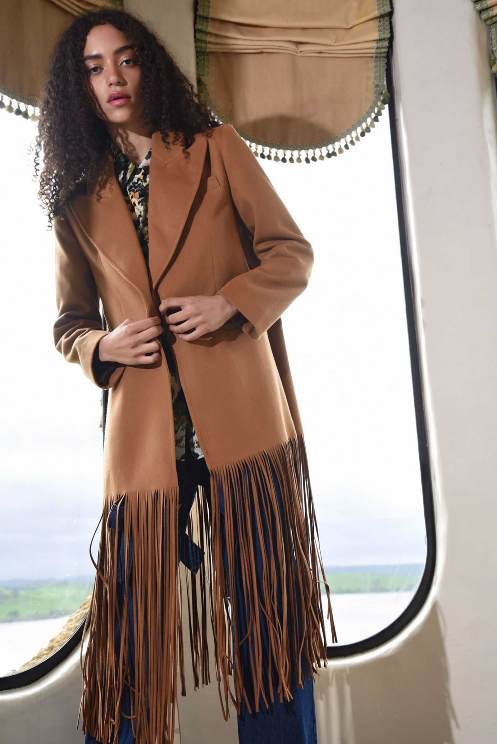 									FRINGE BENEFITS COAT
			