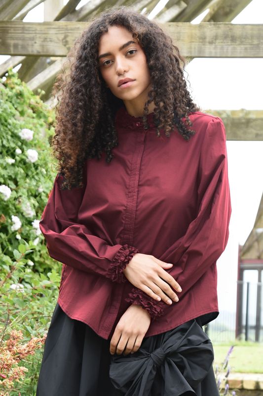 									PRESSED FOR FRILL SHIRT
			