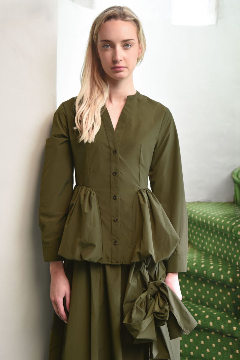 									PEPLUM PLAY TOP
			