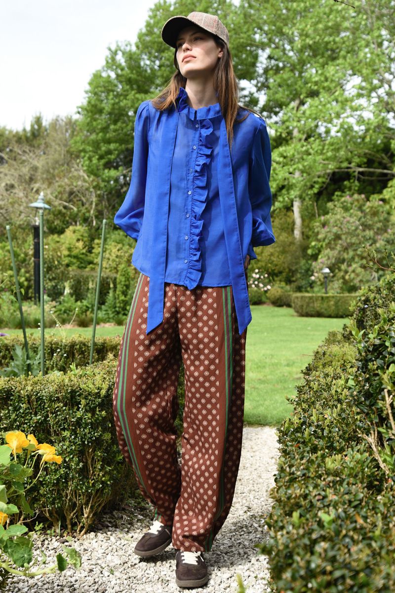 									RUFFLE ACT TOP
								, 			FOLLOW THE TRACK PANT
			