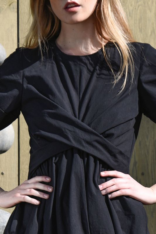 									CAUGHT IN A TWIST DRESS
			