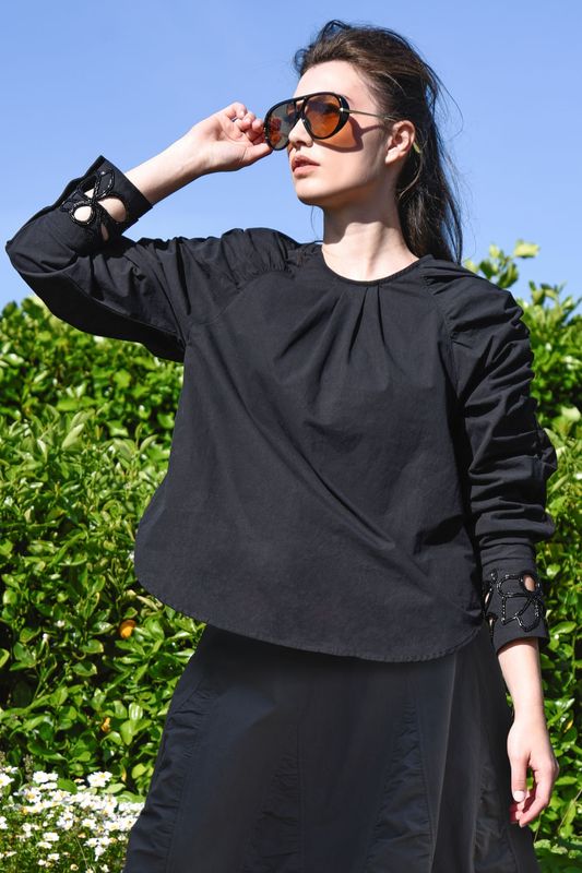 									A PIECE OF THE RAGLAN TOP
			